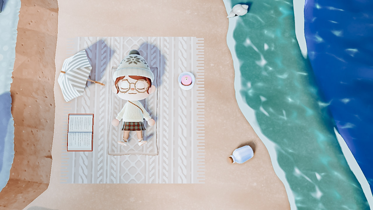 A screenshot of my ACNH avatar laying on the beach.